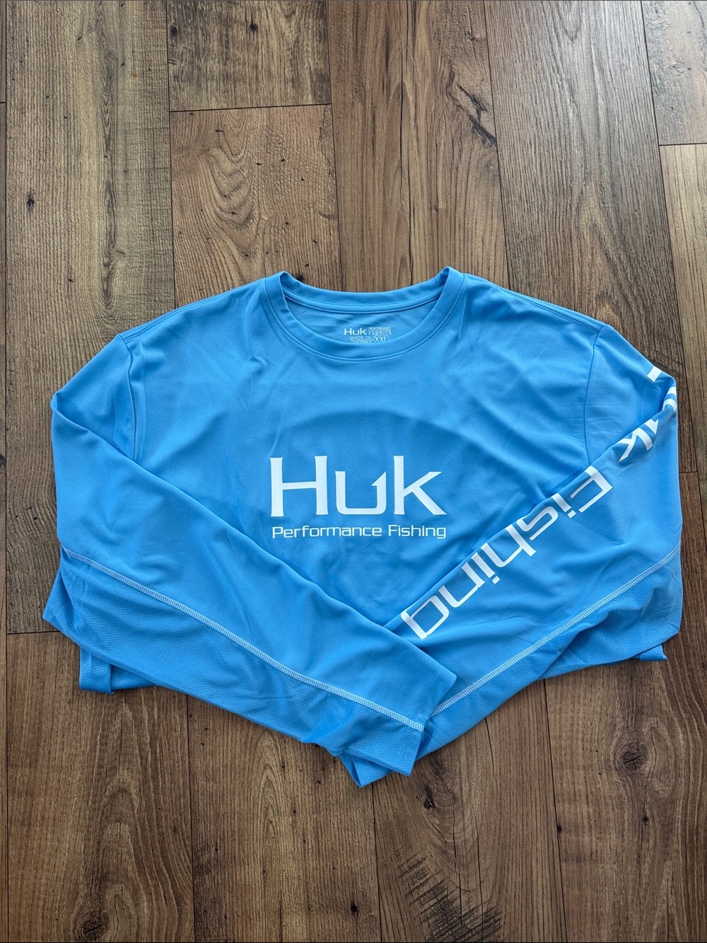 Huk Men’s Long Sleeve Performance Shirt in Blue with White Logo